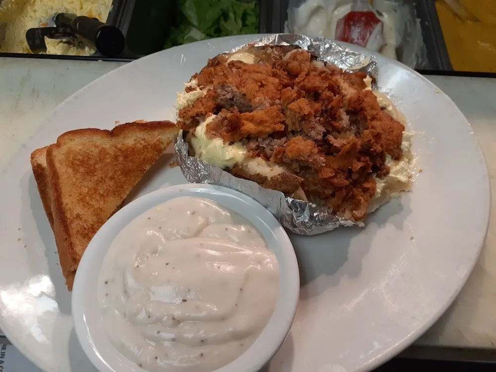 Stuffed Baked Potato with Chicken Fried Steak and Cream Gravy